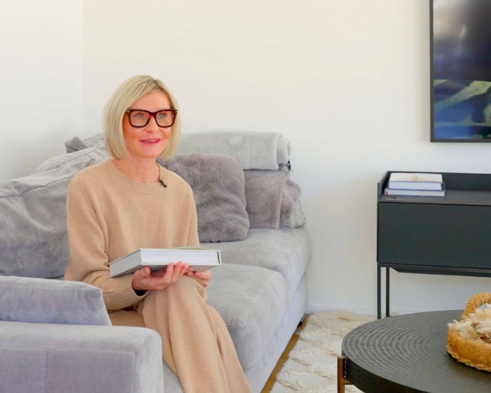 Two men sitting on the couch in their villa in Mallorca.
